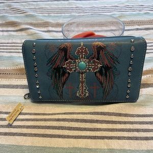 This beautiful angels wings and cross wallet is from Monte west